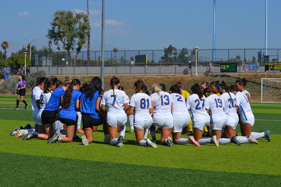 UCR Women's Soccer Team Huddle
